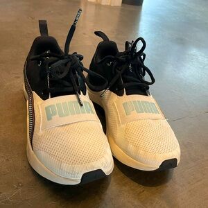 barely worn, Puma white and black trainers with blue and pink detailing.